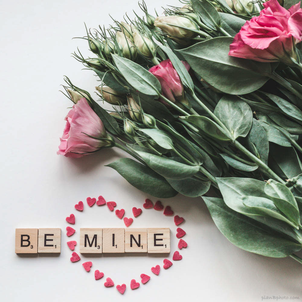 Be mine words with flowers and a heart. Valentine's image.