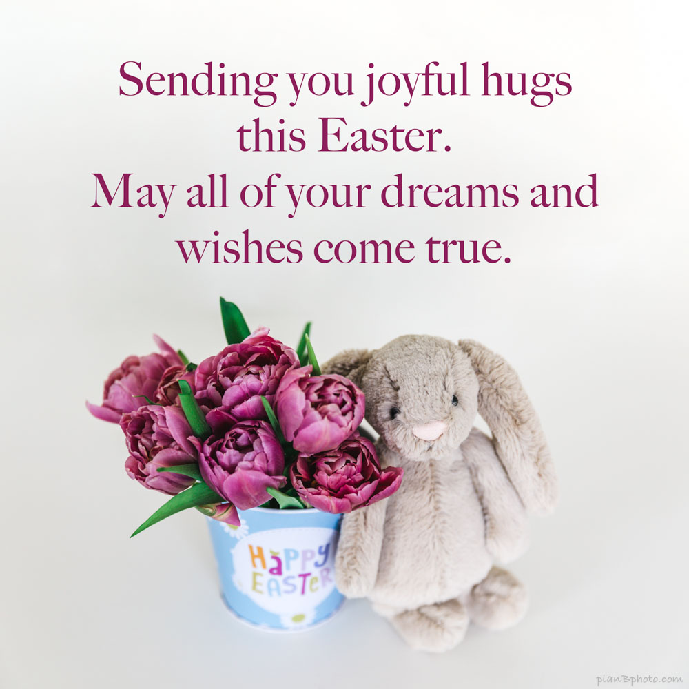 Easter wish of hugs and flowers from an Easter bunny