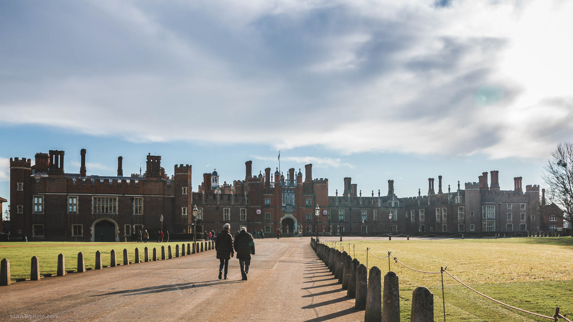 Hampton Court main entrance with people walking
