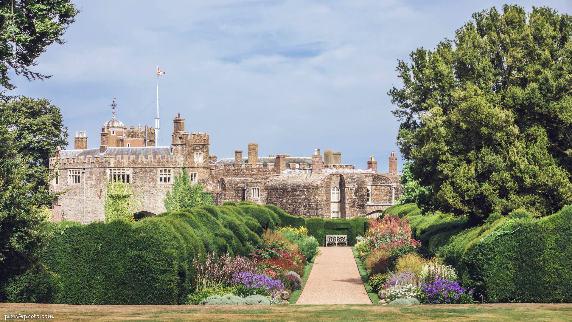 Image of a Walmer Castle et summer with beautiful path surrounded by flowers