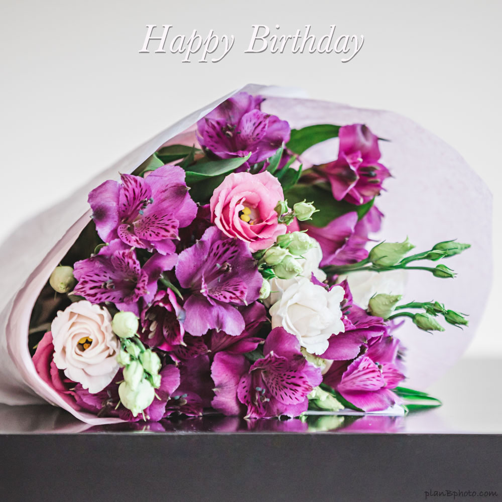 Birthday bouquet with pink and violet flowers